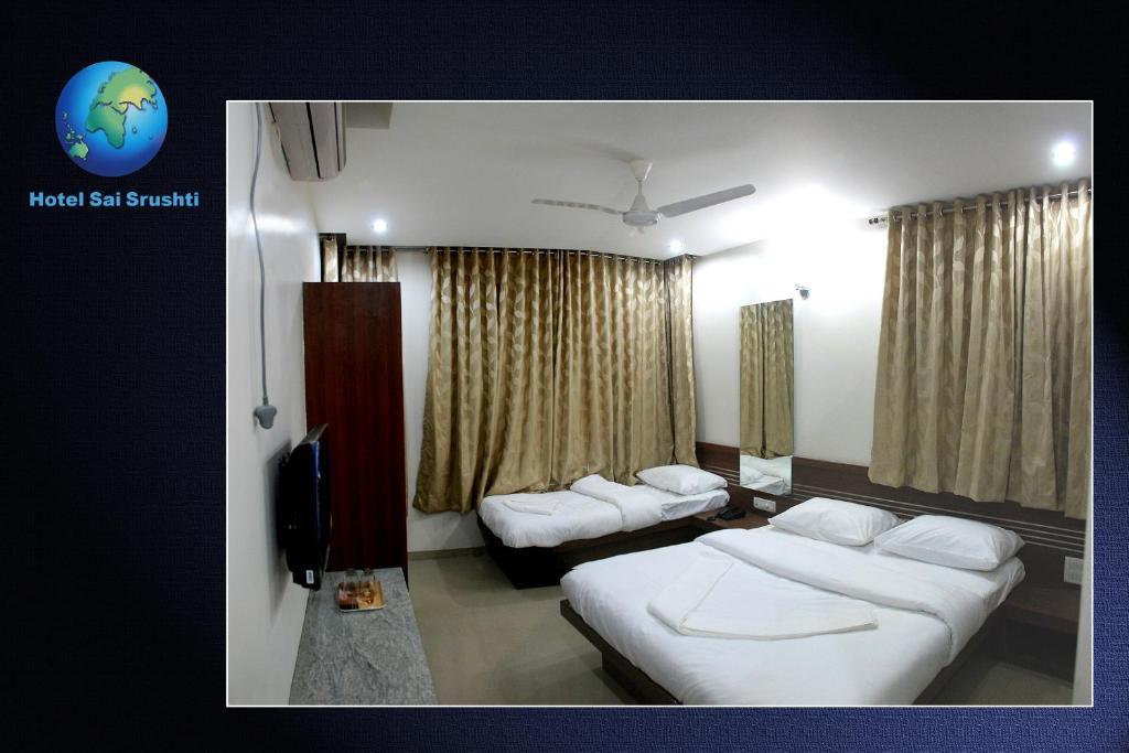 Sai Srushti Hotel Shirdi Bilik gambar
