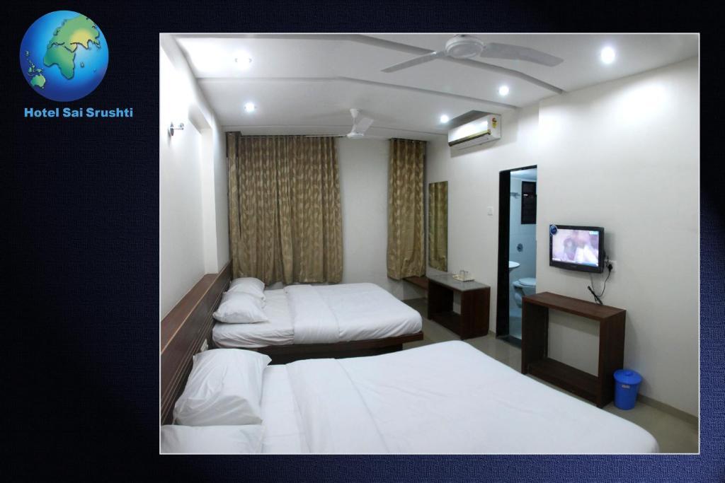 Sai Srushti Hotel Shirdi Bilik gambar