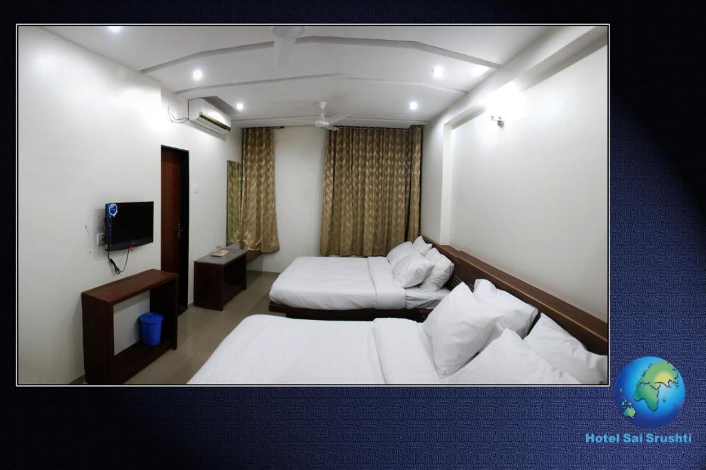 Sai Srushti Hotel Shirdi Bilik gambar