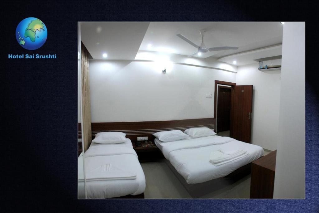 Sai Srushti Hotel Shirdi Bilik gambar