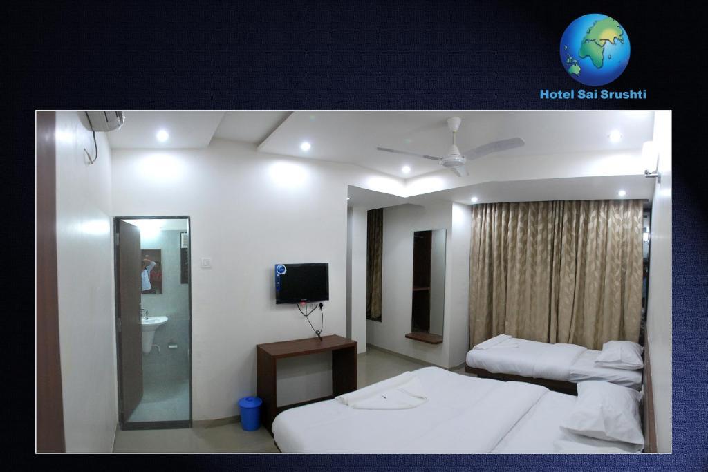 Sai Srushti Hotel Shirdi Bilik gambar
